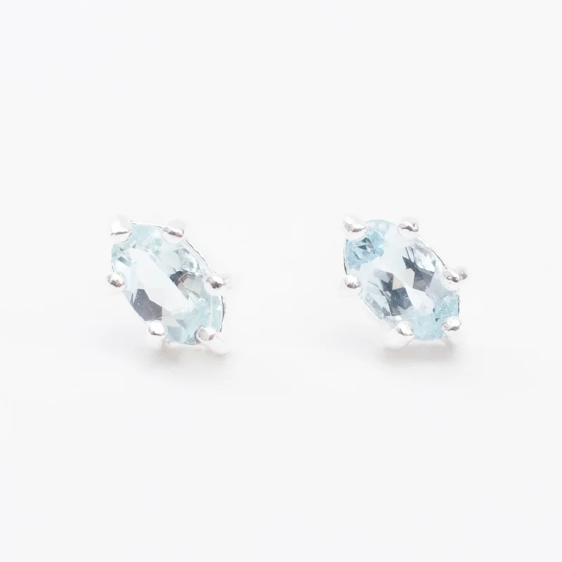 women's wedding earrings-Silver Oval Aquamarine Claw Set Studs