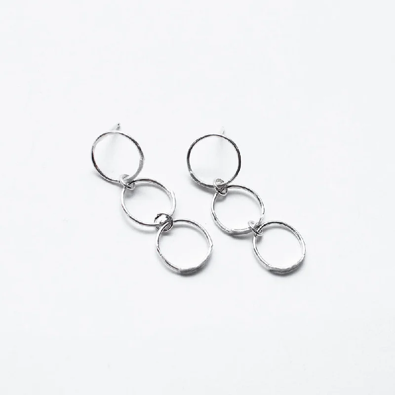 women's crystal earrings-Silver Triple Hand Hammered Circle Studs