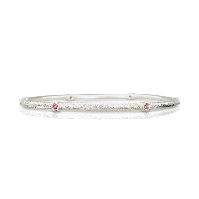 women's sleek silver bangles-Sputnik Bangle in Sterling Silver with Padparadscha Sapphires