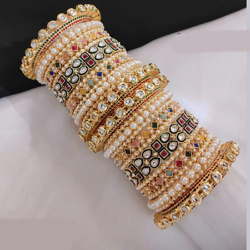 women's engraved charm bracelets-Akruti Collection Gold Plated Kundan Stone And Crystal Stone Pearls Bangles Set